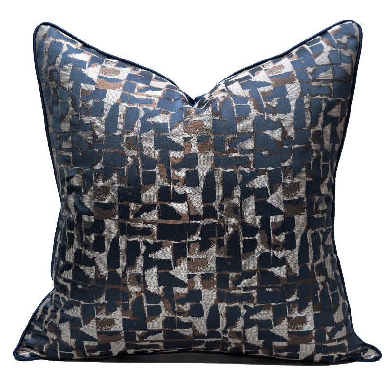 Modern metallic decorative pillow cover with geometric blue, silver, and brown pattern