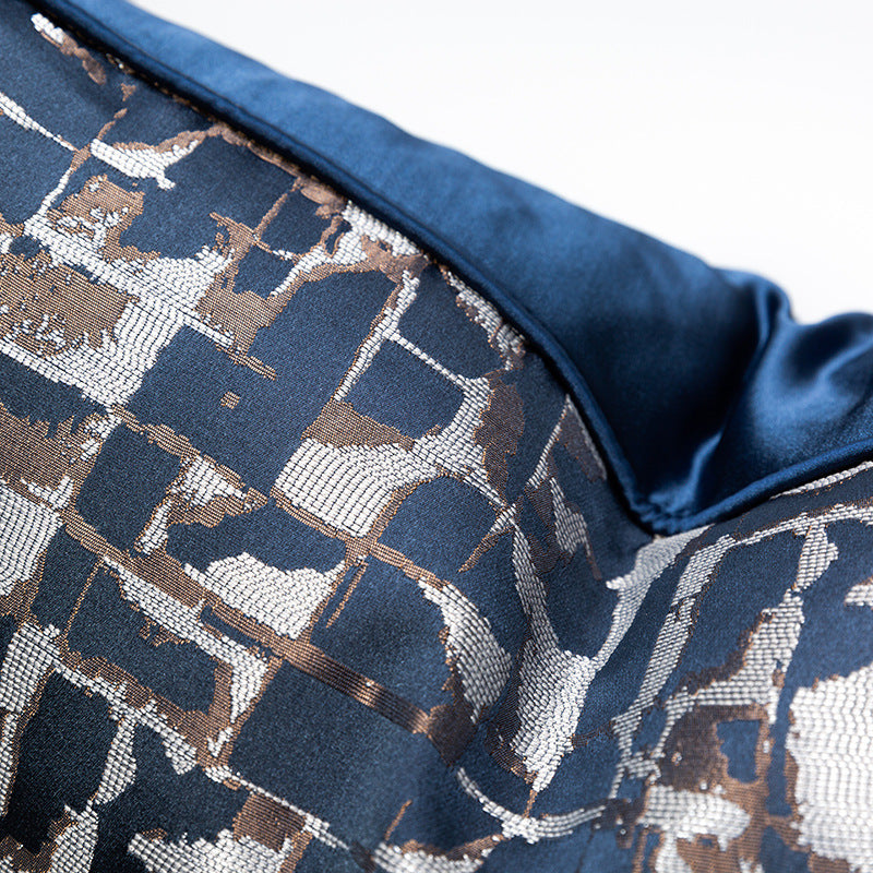 Modern metallic decorative pillow cover in blue and gold geometric pattern from StuffedHome