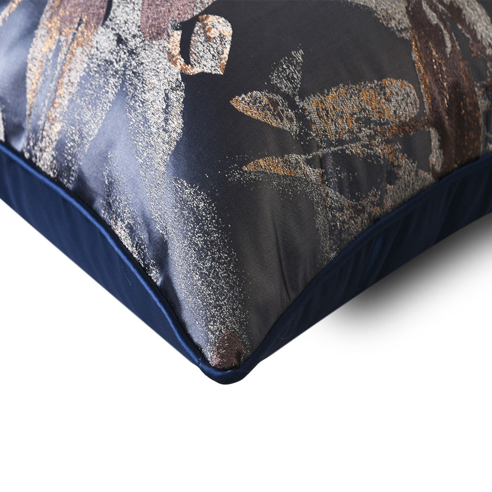 Detailed view of navy blue cushion piping and reinforced corner