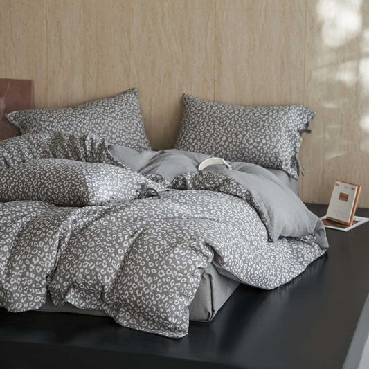 Neutral leopard print cotton gauze bedding set with pillows on a modern bed