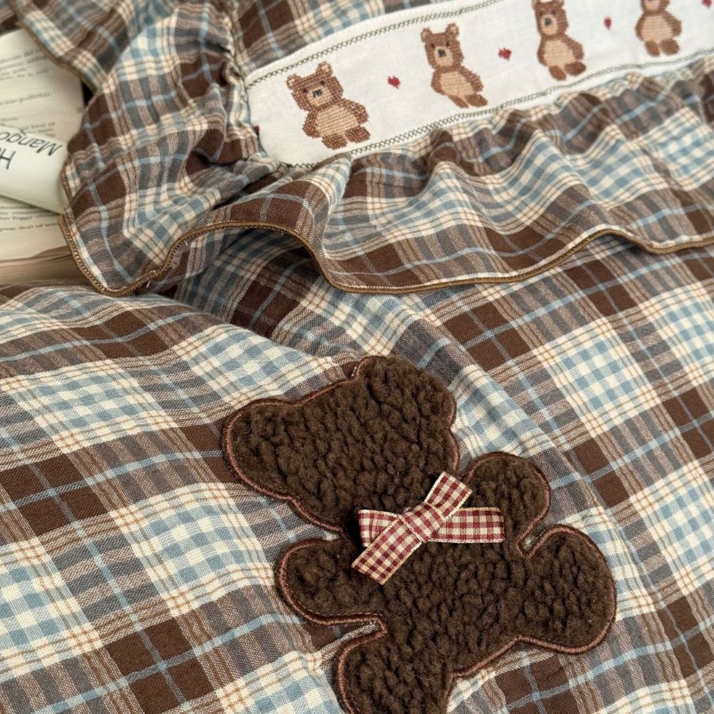 Plaid fabric with teddy bear applique and embroidery