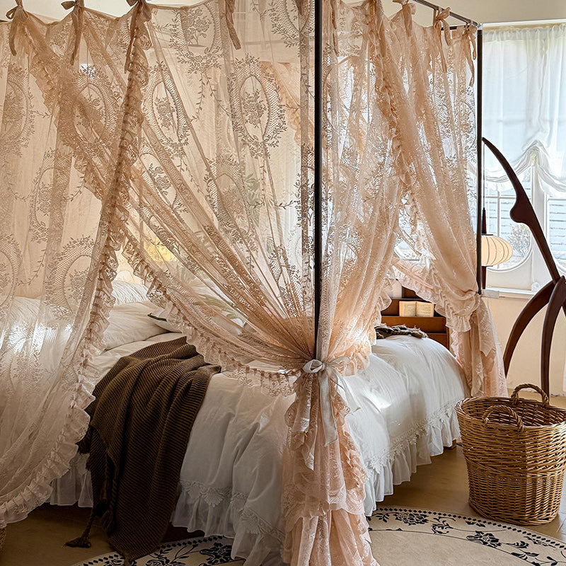 Romantic lace bed canopy curtains on a four-poster bed in a cozy, elegant bedroom.