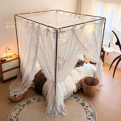 Bed with lace canopy in a bright bedroom