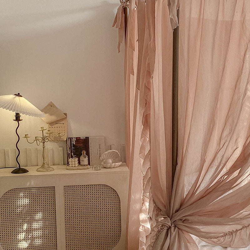 Romantic ruffled canopy curtains for 4-poster bed in cozy, elegant bedroom setting