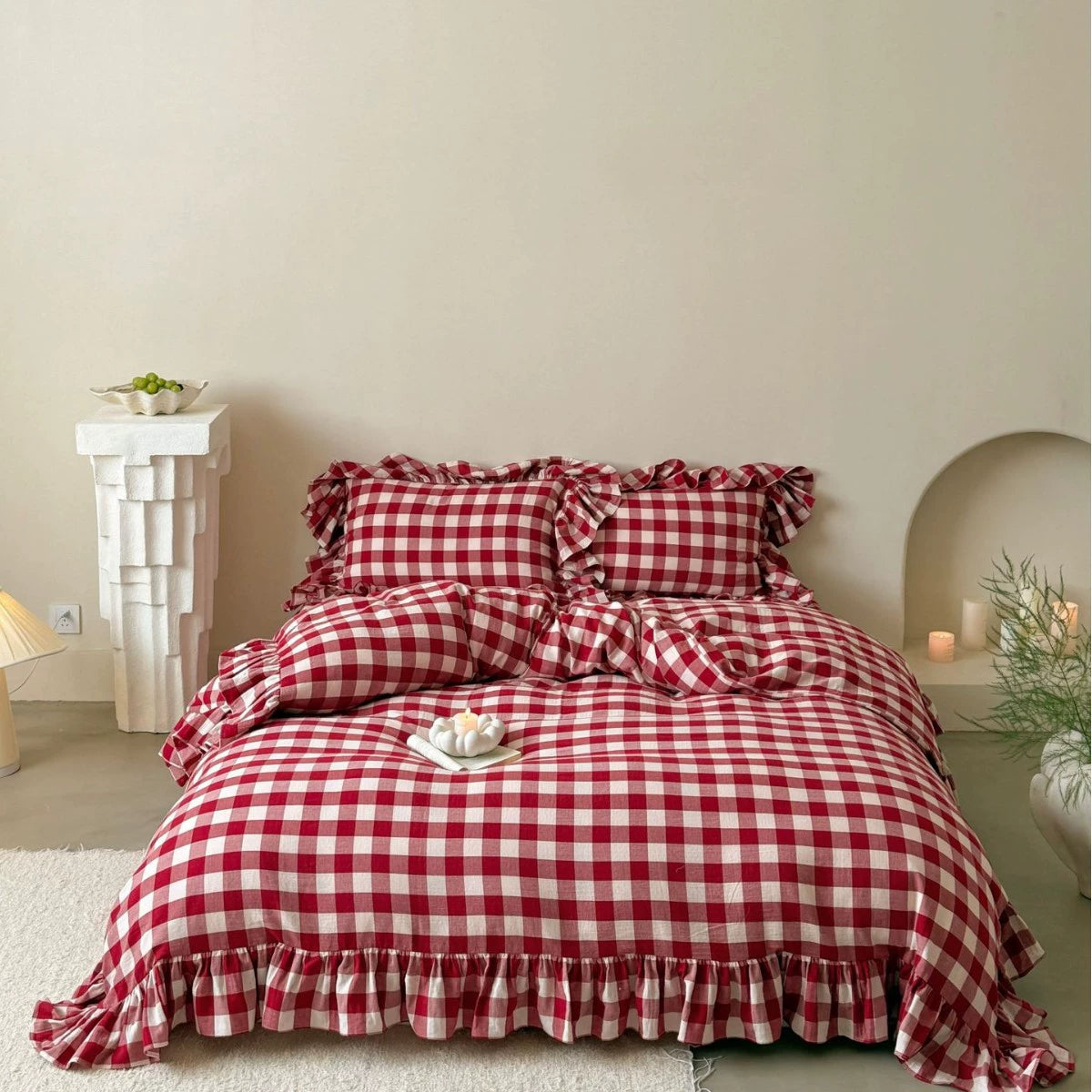 Full view of the Ruffled Red Checkered Muslin Bedding Set in a vintage room setting.