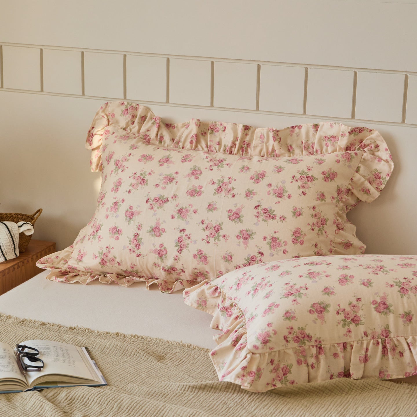 Soft pink floral cotton muslin ruffle pillow shams, charming bedding essential for a cozy, vintage-styled home