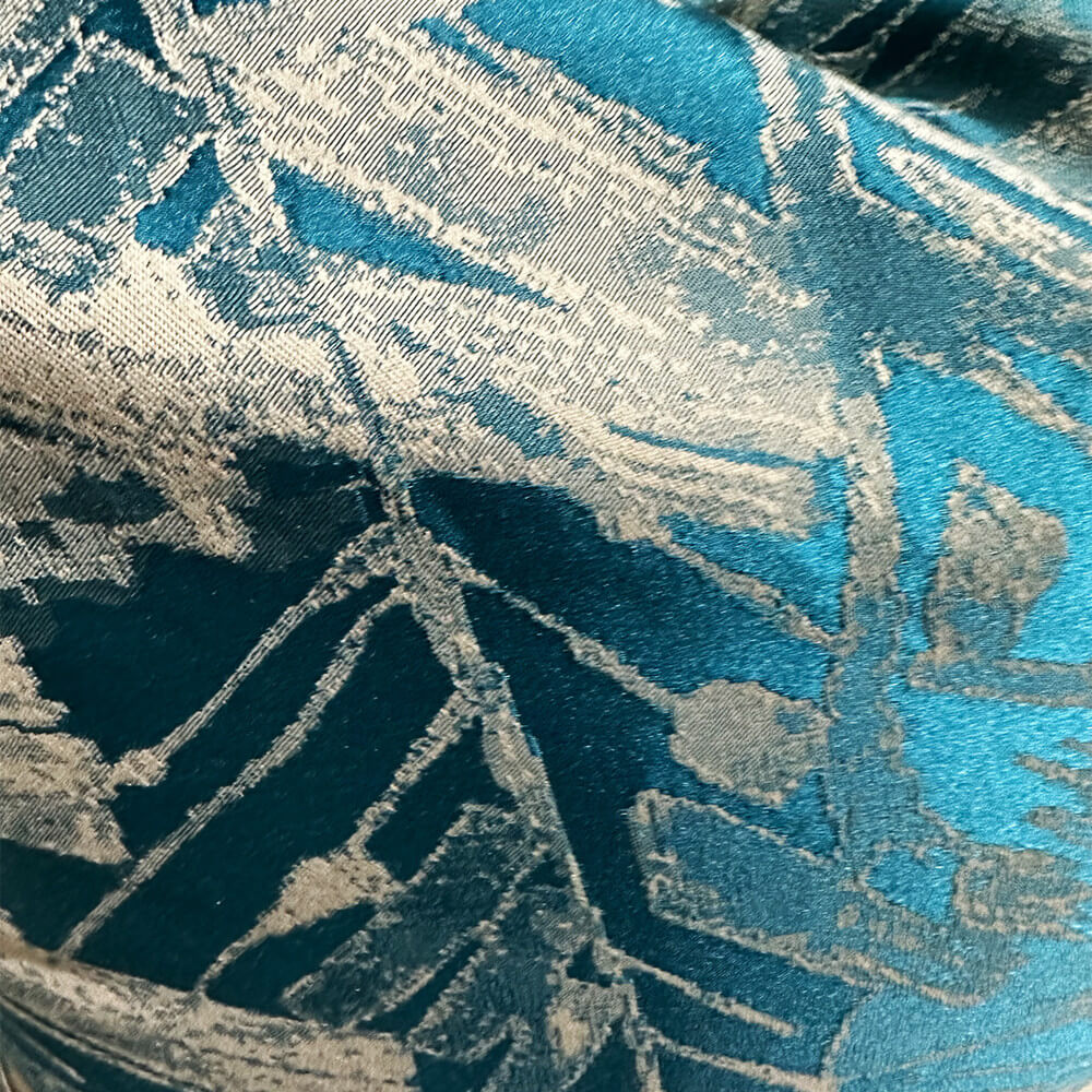 Soft teal geometric textured decorative pillow cover with modern woven pattern