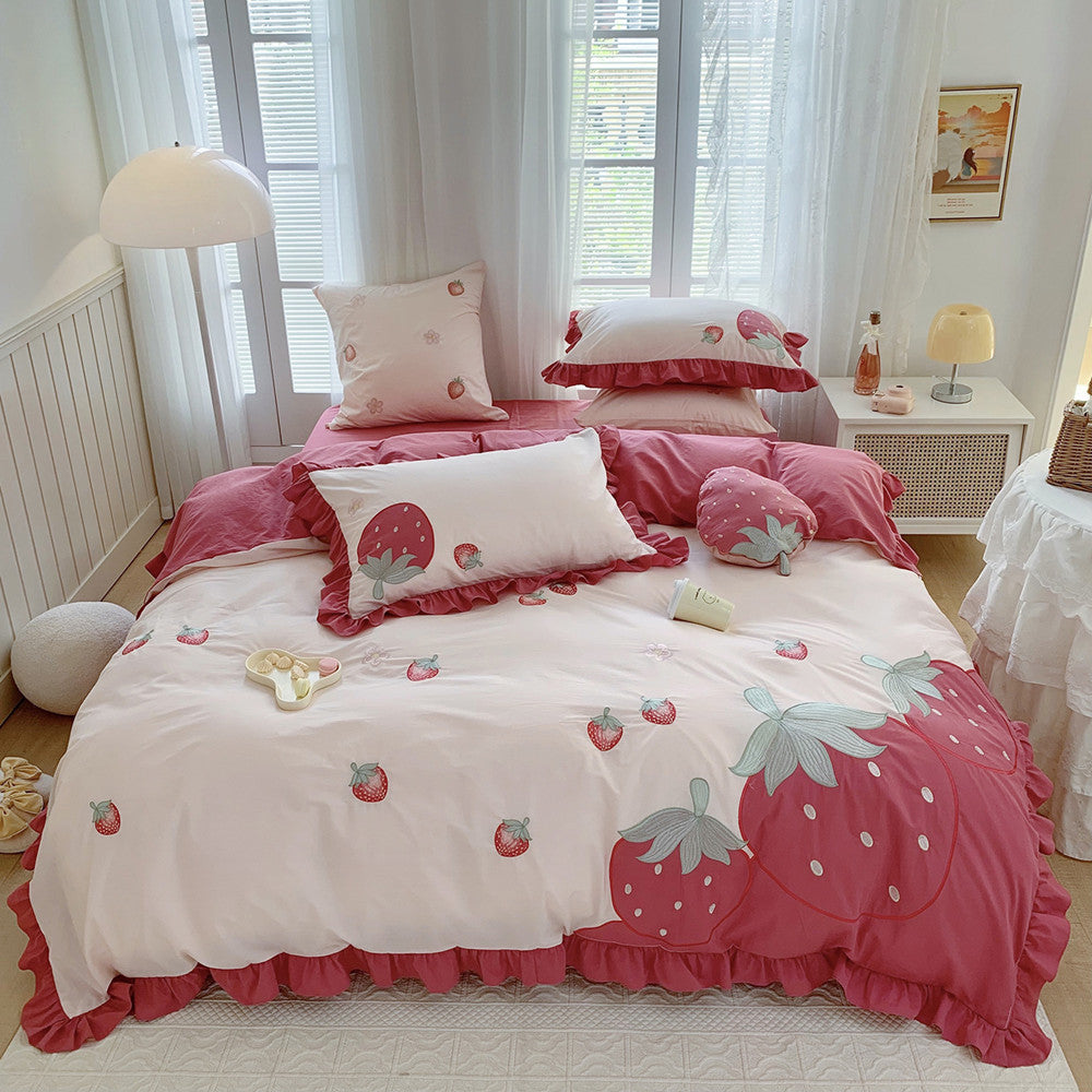 Pink strawberry cotton bedding set in cozy bedroom, sustainable and natural StuffedHome decor