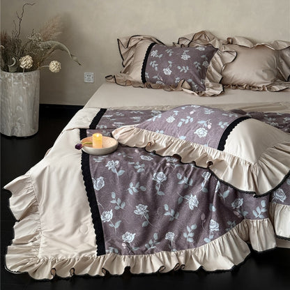 Dusty mauve TENCEL floral comforter set with wide ruffles and black trim