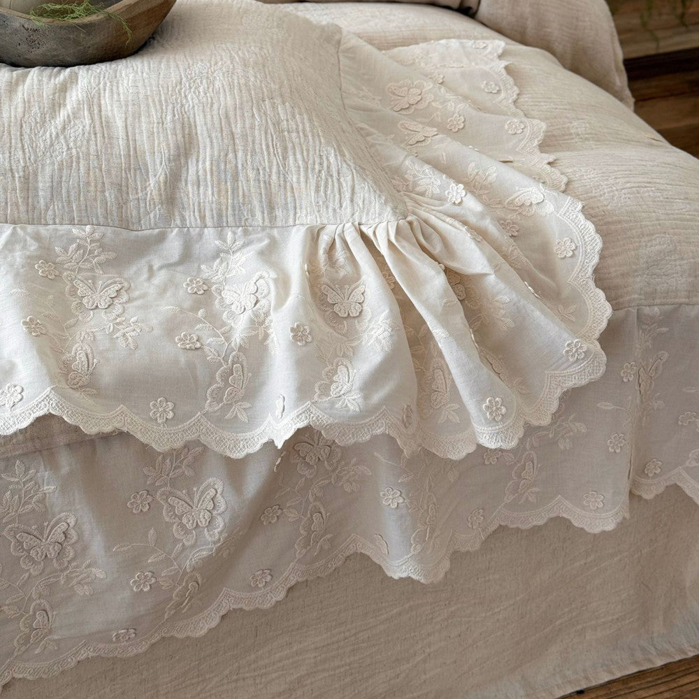 Cream textured linen cotton bedding set with embroidered floral and butterfly trim