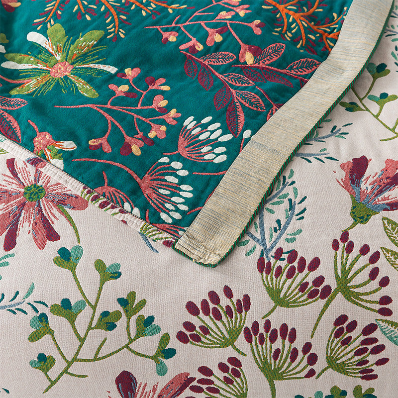 Couverture réversible à motif floral nordique