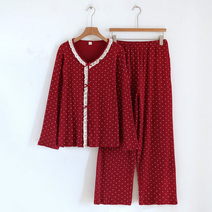 Red cotton pajama set for women with white heart pattern and ruffle trim, long sleeves and pants