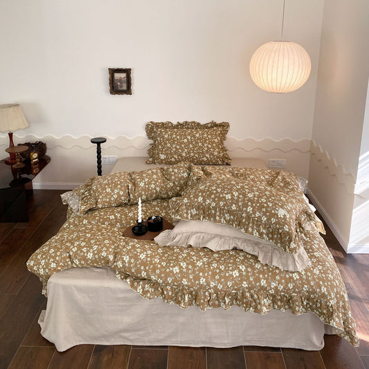 Bedding Earth Tones: Full bedroom view of the earth-tone floral ruffled bedding set with a large round paper lantern.