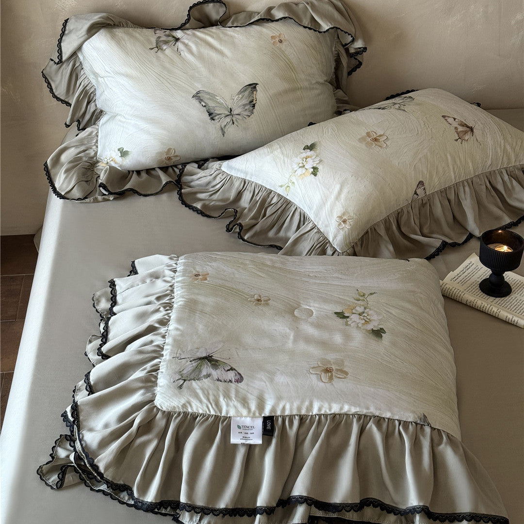 Soft TENCEL™ comforter with watercolor butterfly print and ruffled edges