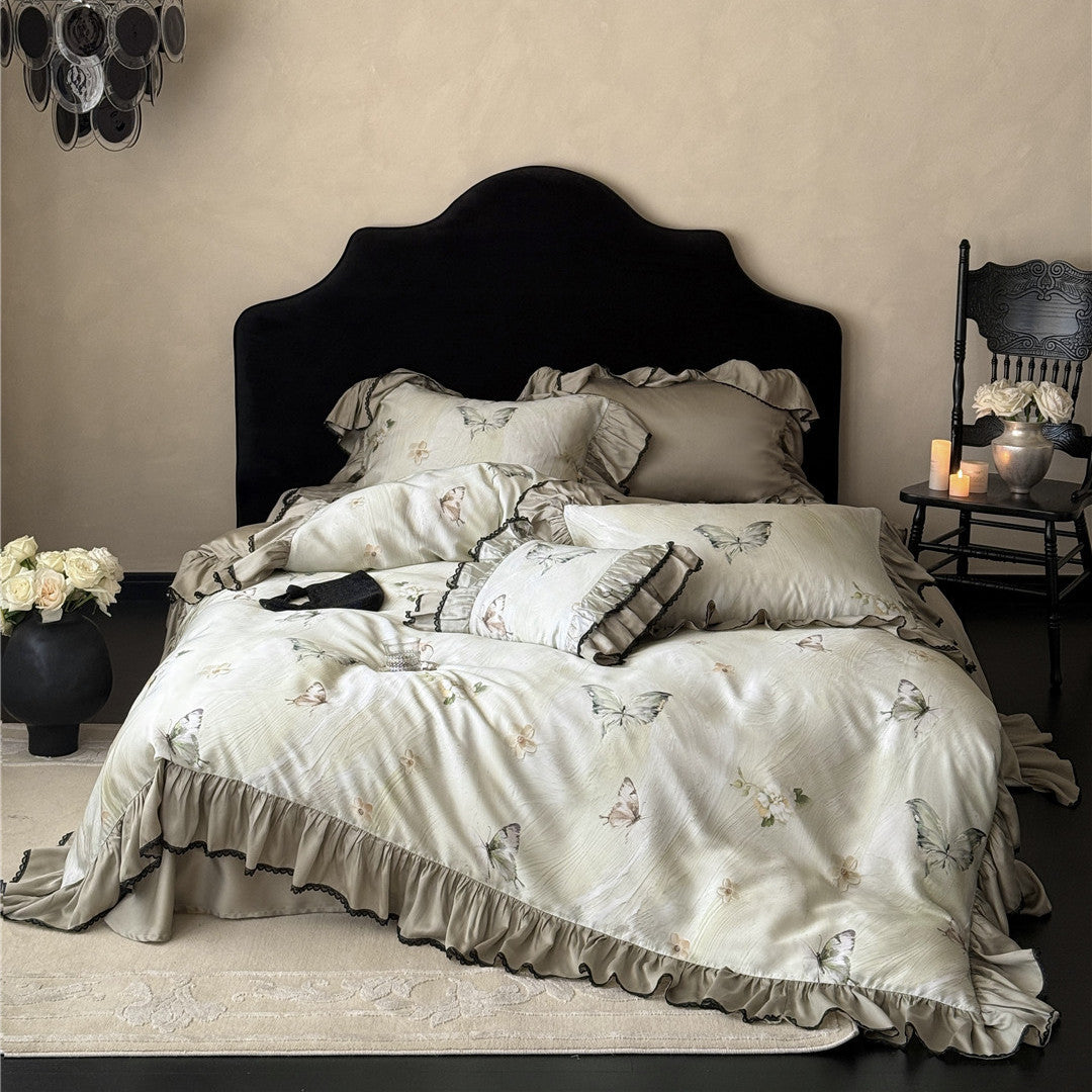 Butterfly comforter set in soft TENCEL™ with ruffled trim – full bed view