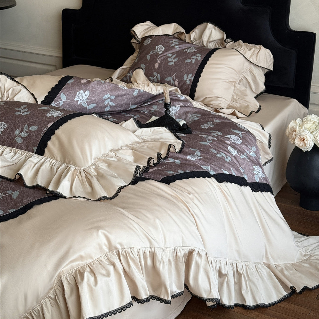 Silky mauve rose bedding with pillowcases and ruffled duvet cover