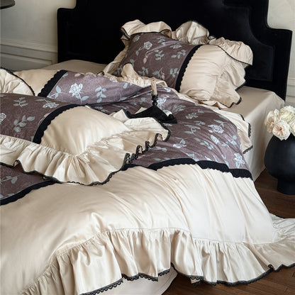 Silky mauve rose bedding with pillowcases and ruffled duvet cover