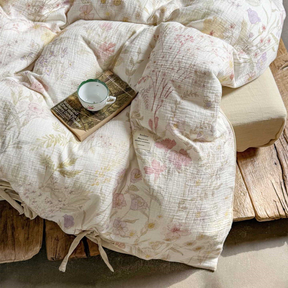 Detailed shot of floral cotton duvet with tag – soft botanical print