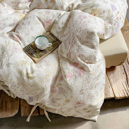 Detailed shot of floral cotton duvet with tag – soft botanical print