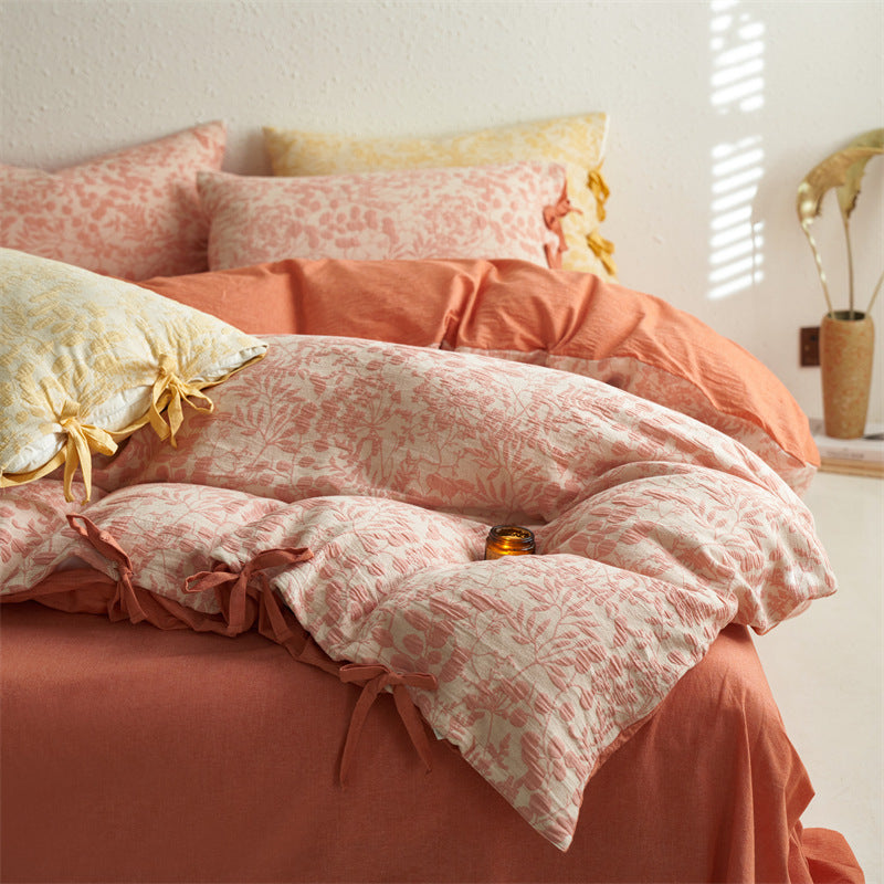 close-up of pink Botanical Jacquard Bedding Set in  Cotton Gauze
