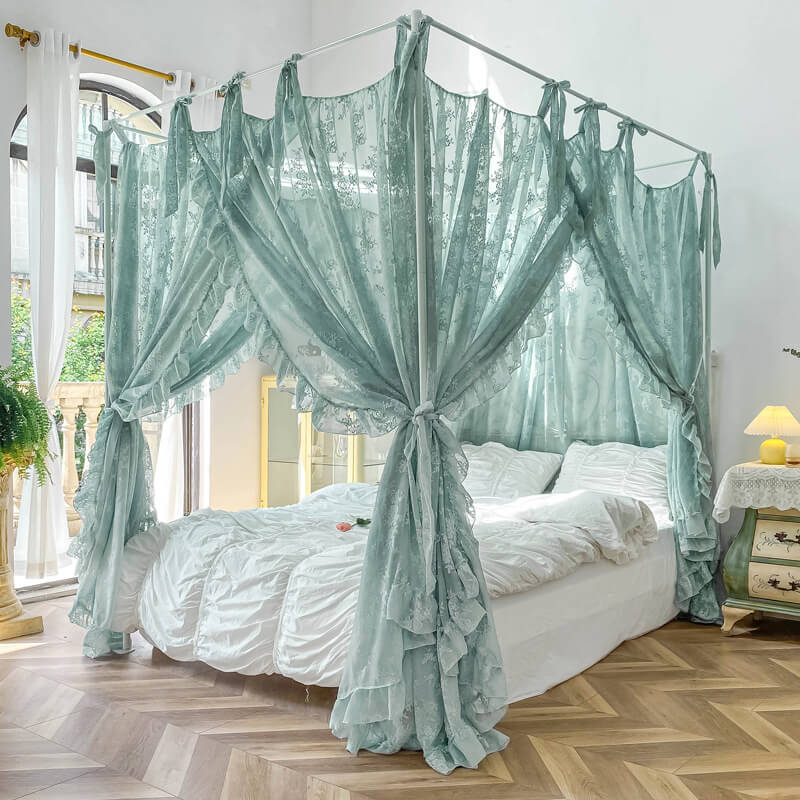 Elegant 4-poster bed with floral lace ruffle canopy curtains in airy, bright bedroom with natural light