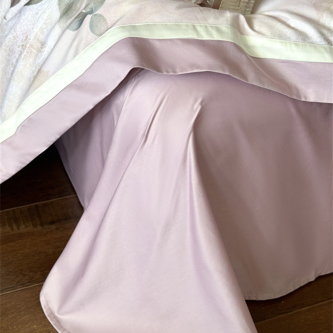 Detail of pink duvet cover and flat sheet in rose garden duvet set