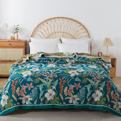 Double-sided cotton throw blanket with colorful botanical motifs