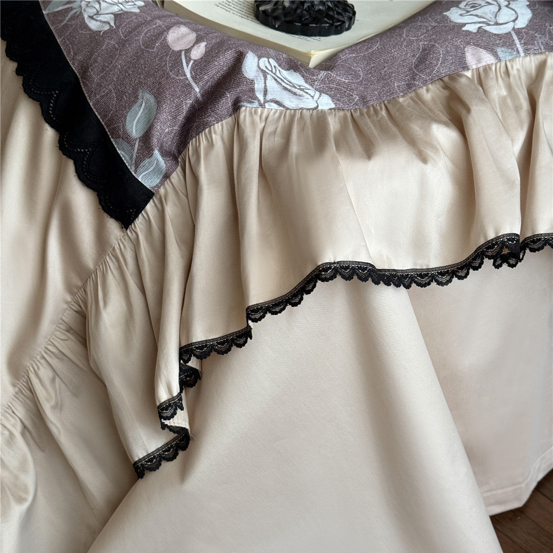 Close-up of ruffled edge and black lace trim on TENCEL bedding