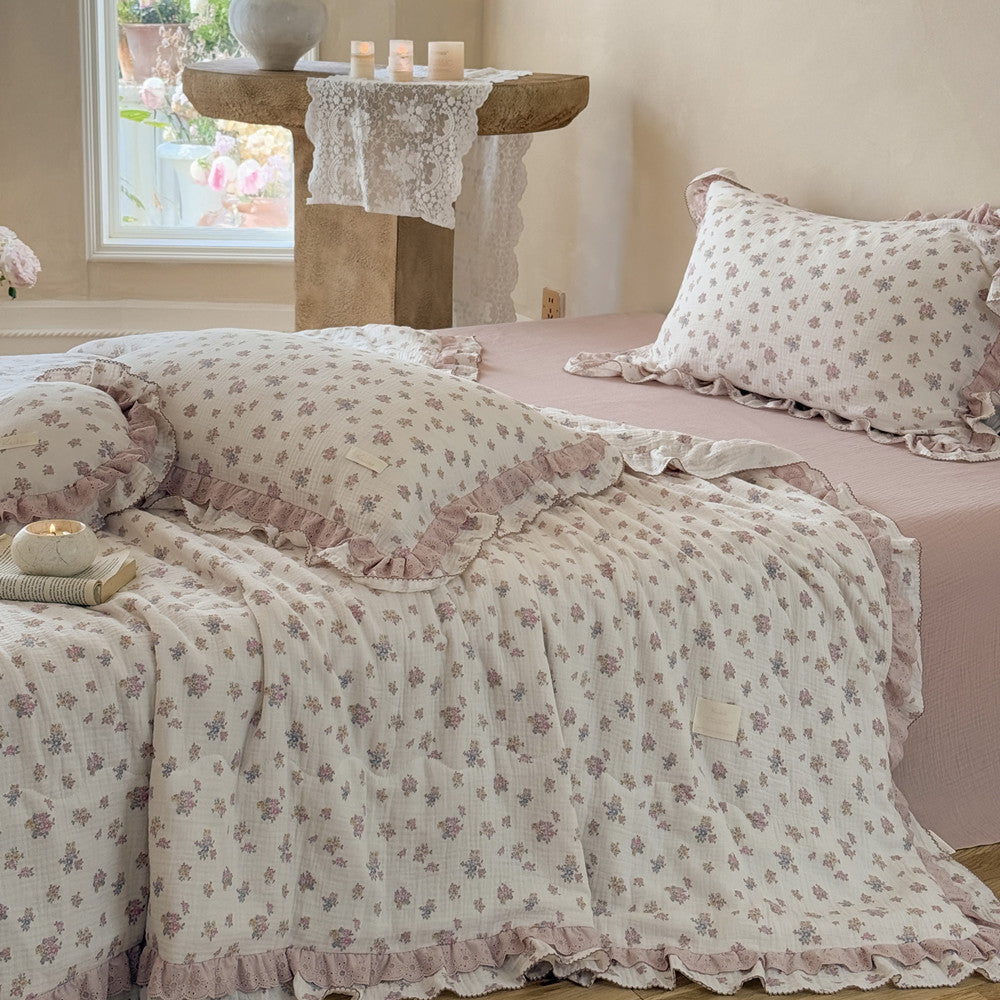 Close-up of gauze cotton fabric and ruffled edge on comforter