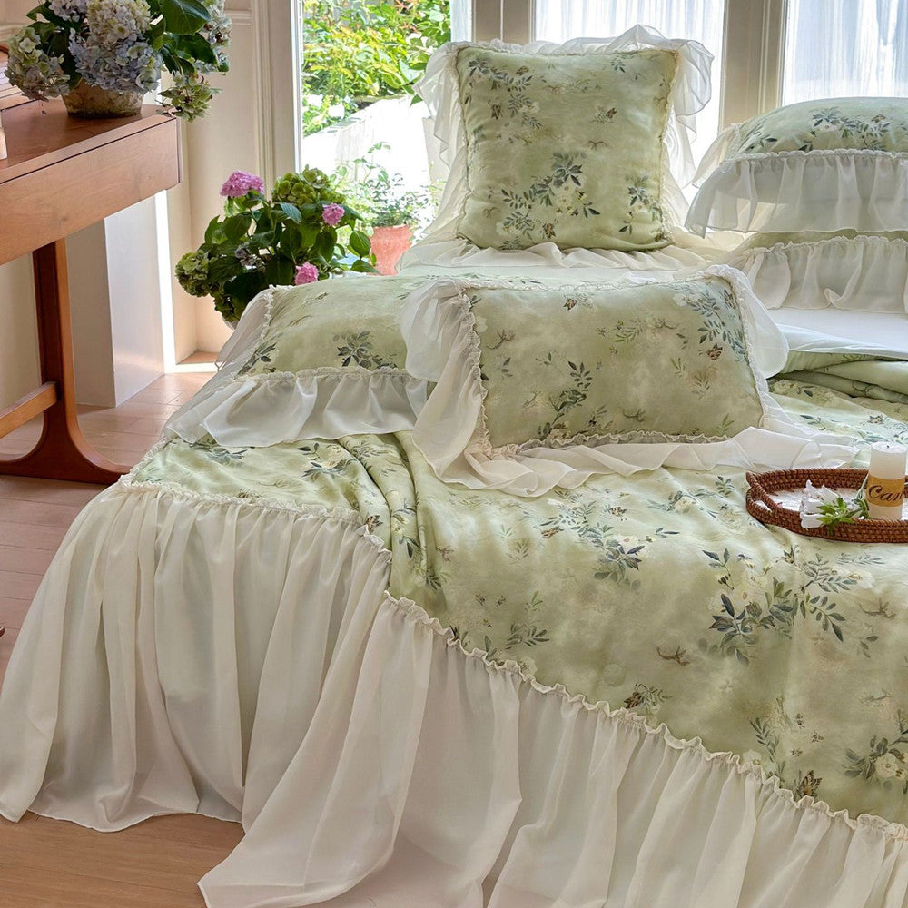 Soft green floral comforter with nature-inspired print