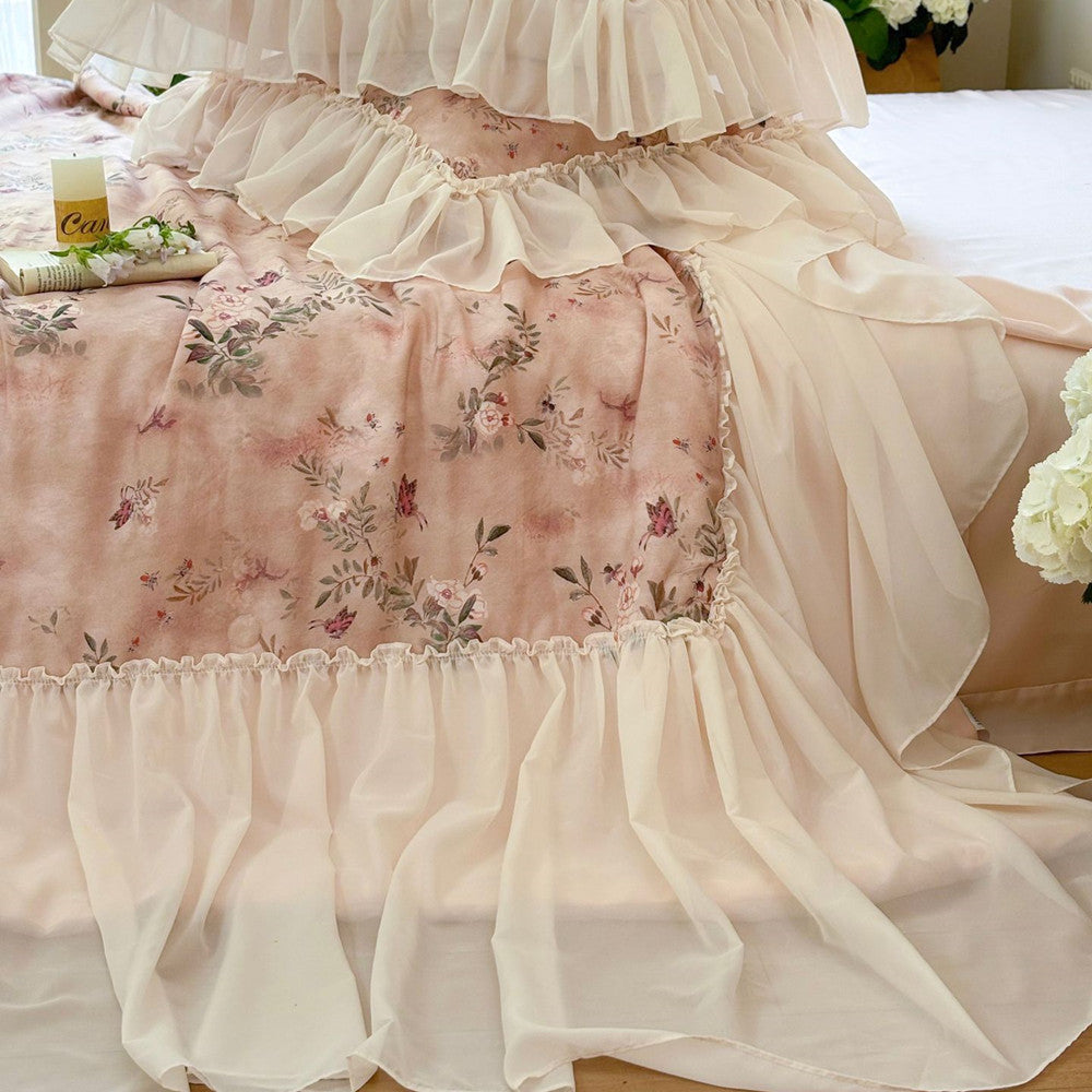 Side view of soft pink TENCEL comforter with trim